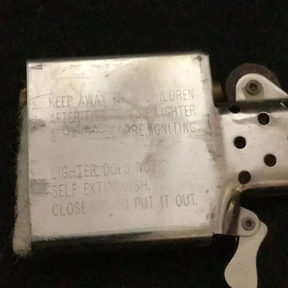 Zippo F-Xllll candle striker needs flint